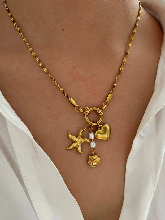 Product title is Gautti Women's Heart Necklace  