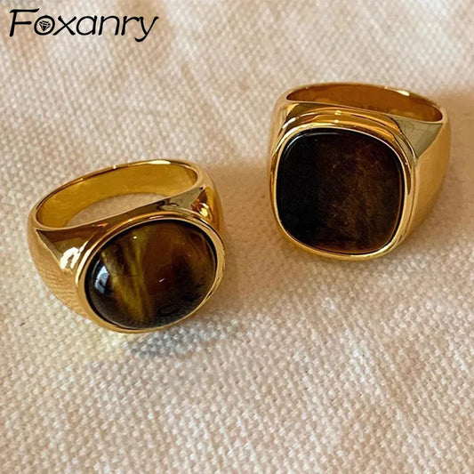 Product title is Foxe Gold  Tiger Eye Rings  