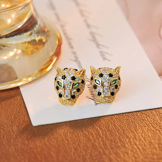 Product title is Keltoum Leopard Earrings  